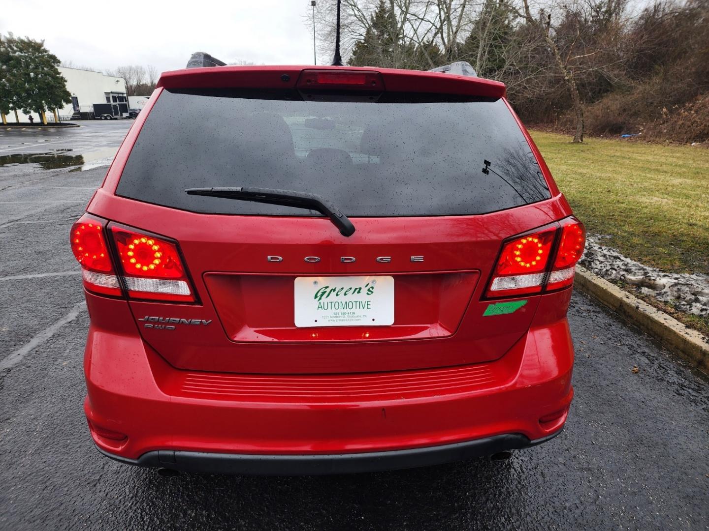 2014 RED /Black Dodge Journey SXT AWD (3C4PDDBG8ET) with an 3.6L V6 DOHC 24V engine, 6-Speed Automatic transmission, located at 1221 Madison St., Shelbyville, TN, 37160, (931) 680-9439, 0.000000, 0.000000 - Photo#2